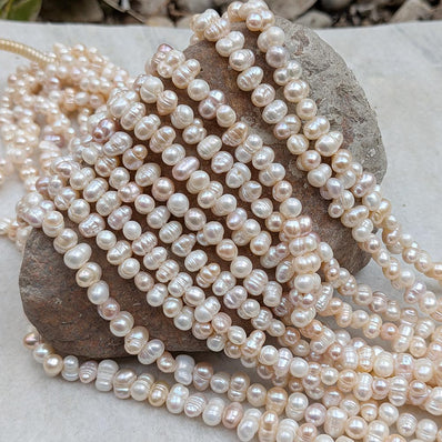 1 STRING PACK' BEAD COUNT' 70-72 PIECES' REAL FRESHWATER PEARL SIZE APPROX' 6-10 MM