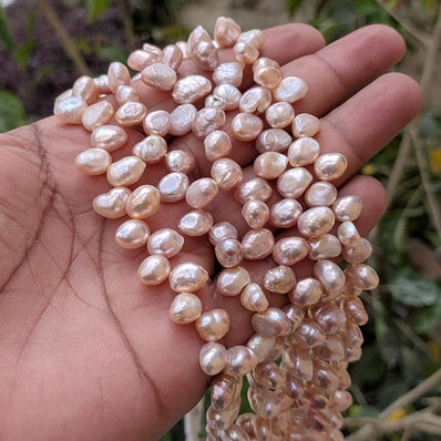 1 STRING PACK' BEAD COUNT' 68-70 PIECES' REAL FRESHWATER PEARL SIZE APPROX' 7-12 MM