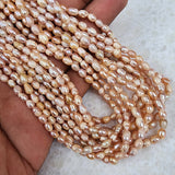 62-64 PCS/STRAND/LINE' RICE PEARLS' NATURAL FRESHWATER PEARL BEADS NATURAL COLOR PEARL BEADS ' FOR DIY NECKLACE BRACELET JEWELRY MAKING BEADING SUPPLIES IN SIZE ABOUT 4-5 MM