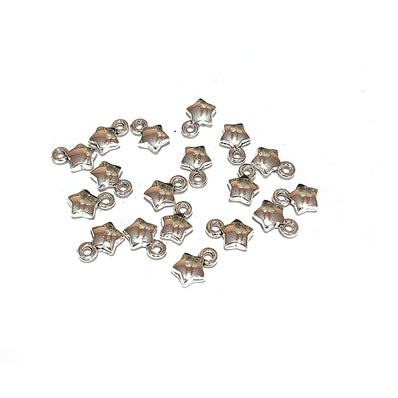 50pcs pkg. small star charms in size about 6mm