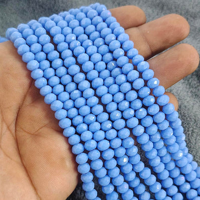 1 LINE/STRING PACK 6x4 MM OPAQUE BABY BLUE CRYSTAL TYRE GLASS BEADS (APPROX BEADS 80-85)