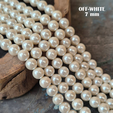 7 MM' OFF WHITE ITALIAN SHELL PEARLS' 53-54 PIECES APPROX SOLD BY PER LINE/LOOSE PACK