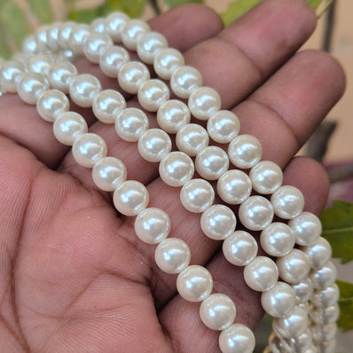 7 MM' OFF WHITE ITALIAN SHELL PEARLS' 53-54 PIECES APPROX SOLD BY PER LINE/LOOSE PACK