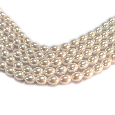 8x6mm Oval Shape Shell Pearl Beads with a smooth glossy finish, ideal for elegant necklaces, bracelets, and premium jewelry making. Uniform, stylish, and perfect for DIY creators. Sold Per Line 51~52 beads