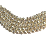 6mm Round Shell Pearl Beads with a smooth high-gloss finish, perfect for delicate bracelets, necklaces, and premium DIY jewelry designs. Uniform, durable, and elegant. Sold Per Line 67~68 beads