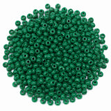 Preciosa Czech Glass Seed Beads 6/0 Size (4mm) Sold Per pack of 20 Grams, Dark Green Opaque Color on white background