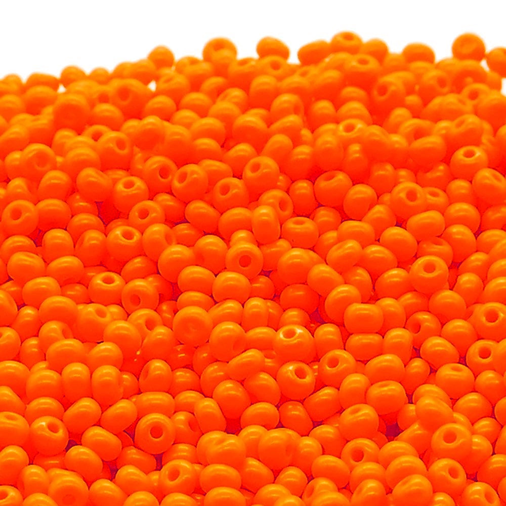 Preciosa Czech Glass Seed Beads 6/0 Size (4mm) Sold Per pack of 20 Grams,Orange Opaque Color on white background