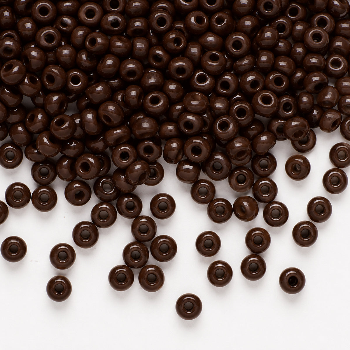 Preciosa Czech Glass Seed Beads 6/0 Size (4mm) Sold Per pack of 20 Grams, Dark Brown Opaque Color on white background