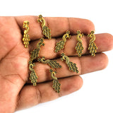 10 PIECES PACK' GOLD OXIDIZED' 26 MM APPROX SIZE'  PEACOCK KOLHAPURI BEADS CHARMS