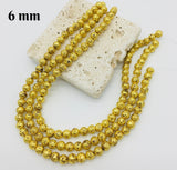 6 MM ROUND' GOLD METACLLIC VOLCANIC LAVA STONE' 60-62 BEADS APPROX SOLD BY PER LINE PACK