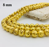 8 MM ROUND' GOLD METACLLIC VOLCANIC LAVA STONE' 44-46 BEADS APPROX SOLD BY PER LINE PACK