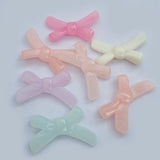 50 Grams Pkg. Pastel color acrylic Beads in size about 32x9mm Bow Shape