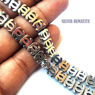 2 PIECES PACK' CHANEL LOGO' ELECTROPLATED' NON MAGNETIC SILVER SHADE HEMATITE BEADS' 12 MM