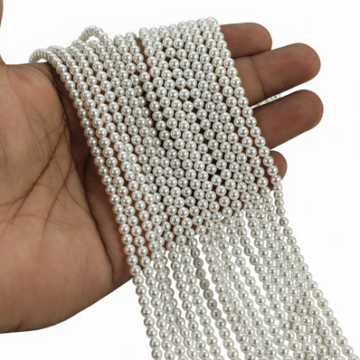 4mm Round Shell Pearl Beads with a smooth glossy finish, ideal for minimalist jewelry, seed-bead designs, and detailed crafting. Uniform, durable, and elegant for premium DIY projects. Sold Per Line 97~98 beads