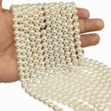 8mm Round Shell Pearl Beads with a smooth glossy finish, ideal for premium necklaces, bracelets, and elegant jewelry designs. Uniform, durable, and perfect for DIY projects. Sold Per Line 51~52 beads