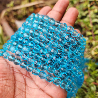 SUPER QUALITY' 8x7 MM' FACETED GLASS BEADS' APPROX 44-45 BEADS SOLD BY PER LINE PACK