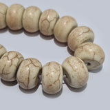 Synthetic Howlite beads size about  9x14mm 45 Beads