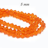 SUPER QUALITY' 5 MM FANCY BI-CONE SHAPE ORANGE FIRE POLISHED GLASS BEADS' APPROX 58-60 BEADS SOLD BY PER LINE PACK