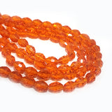 SUPER QUALITY' 8x6 MM FANCY  FACETED OVAL SHAPE ORANGE FIRE POLISHED GLASS BEADS' APPROX 70-72 BEADS SOLD BY PER LINE PACK