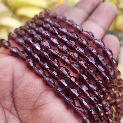SUPER QUALITY' 8x6 MM OVAL FACETED SHAPE PURPLE FIRE POLISHED GLASS BEADS' APPROX 69-70 BEADS SOLD BY PER LINE PACK