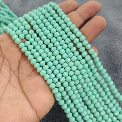 1 LINE/STRING PACK 6x4 MM OPAQUE MINT GREEN CRYSTAL TYRE GLASS BEADS (APPROX BEADS 80-85)