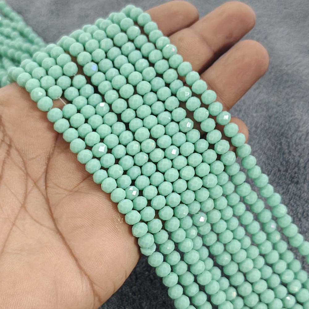 1 LINE/STRING PACK 6x4 MM OPAQUE MINT GREEN CRYSTAL TYRE GLASS BEADS (APPROX BEADS 80-85)