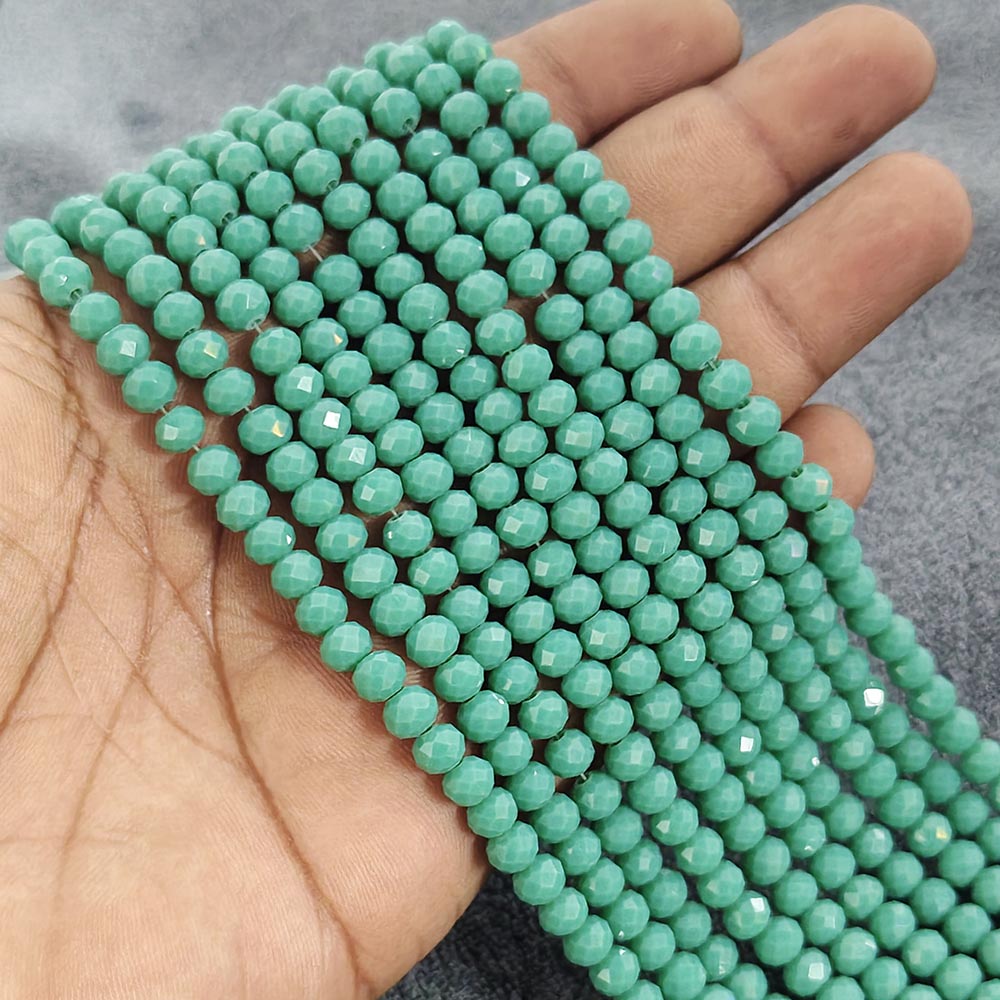 1 LINE/STRING PACK 6x4 MM OPAQUE SEA GREEN CRYSTAL TYRE GLASS BEADS (APPROX BEADS 80-85)