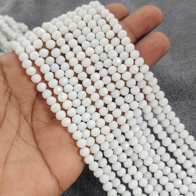 1 LINE/STRING PACK 6x4 MM OPAQUE WHITE CRYSTAL TYRE GLASS BEADS (APPROX BEADS 80-85)