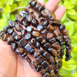ONYX UNCUT ONYX TUMBLE BEADS ' 10-14 MM ' SOLD BY PER LINE' 37-39 PIECES APPROX