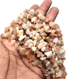 UNCUT SEMI PRECIOUS BEADS' PEACH MOONSTONE' 30 INCHES APPROX' SOLD BY PER LINE PACK