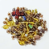 100 pcs lot, glass charms mostly brown color made with brass wire