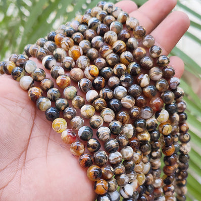 1 STRING/LINE PACK' APPROX 46-47 PIECES' 8MM SIZE FIRE AGATE BEADS