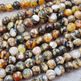 1 STRING/LINE PACK' APPROX 46-47 PIECES' 8MM SIZE FIRE AGATE BEADS