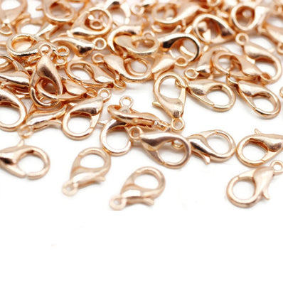 12 MM SIZE, LOBSTER CLASPS, Rose gold PLATED, MATERIAL ZINC, SOLD BY PER PKG OF 20 PIECES USED IN JEWELLERY MAKING.