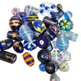 500 Gram Pack, Blue color tone, Bead mix, lampworked glass, opaque to transparent mixed colors, 7x4mm-20x11mm mixed shapes with 1.5-2mm hole. Sold per 500 Grams pkg, approximately 180~280 beads. Depend on the size