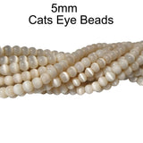 Monalisa Beads, 5mm light champagne color  Cats Eye Beads Sold Per Strand of 16 Inches, approx  94 beads