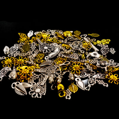 100 PIECES ASSORTED MIX PACK' SMALL ADORNMENT GERMAN SILVER CHARMS