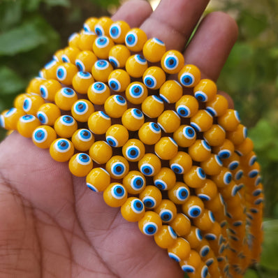 YELLOW OPAQUE' 8 MM ROUND ' SUPER FINE QUALITY EVIL EYE GLASS CRYSTAL BEADS SOLD BY PER LIN PACK' APPROX PIECES 47-48 BEADS