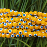YELLOW OPAQUE' 8 MM ROUND ' SUPER FINE QUALITY EVIL EYE GLASS CRYSTAL BEADS SOLD BY PER LIN PACK' APPROX PIECES 47-48 BEADS