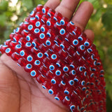 RED TRANSPARENT' 8 MM ROUND ' SUPER FINE QUALITY EVIL EYE GLASS CRYSTAL BEADS SOLD BY PER LIN PACK' APPROX PIECES 47-48 BEADS