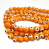 Orange 8 MM ROUND ' SUPER FINE QUALITY EVIL EYE GLASS CRYSTAL BEADS SOLD BY PER LIN PACK' APPROX PIECES 47-48 BEADS