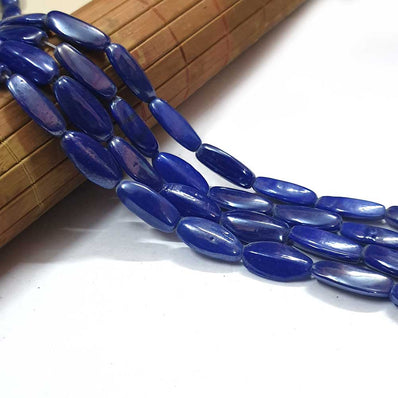 12x23mm Approx Size Handmade glass beads Sold Per line  of 16 inches (strand) 18 Beads approx in a line