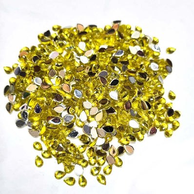 500 PCS PACK DROP ACRYLIC CRYSTAL RHINESTONES IMITAION GEMS FOR COSTUME MAKING, FLAT BACK USED IN JEWELLERY ,HOBBY WORK ,NAIL ART ,CRAFT WORK ETC in Size about  4x6 Milimeter