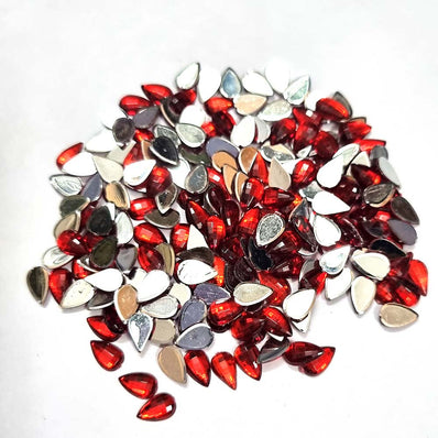 500 PCS PACK DROP ACRYLIC CRYSTAL RHINESTONES IMITAION GEMS FOR COSTUME MAKING, FLAT BACK USED IN JEWELLERY ,HOBBY WORK ,NAIL ART ,CRAFT WORK ETC in Size about  7x10 Milimeter