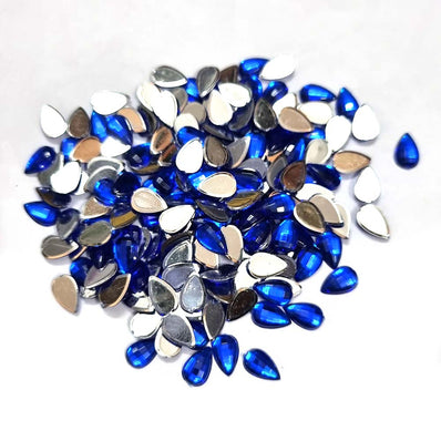 500 PCS PACK DROP ACRYLIC CRYSTAL RHINESTONES IMITAION GEMS FOR COSTUME MAKING, FLAT BACK USED IN JEWELLERY ,HOBBY WORK ,NAIL ART ,CRAFT WORK ETC in Size about  7x10 Milimeter