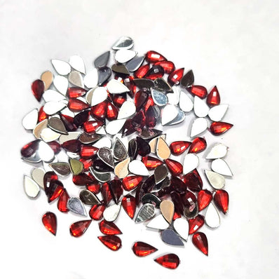 500 PCS PACK DROP ACRYLIC CRYSTAL RHINESTONES IMITAION GEMS FOR COSTUME MAKING, FLAT BACK USED IN JEWELLERY ,HOBBY WORK ,NAIL ART ,CRAFT WORK ETC in Size about  7x10 Milimeter