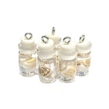 BEAUTIFUL TUBE PENDANTS FILLED WITH COWRIE SHELLS SOLD BY PER PIECE PACK' 20 MM APPROX