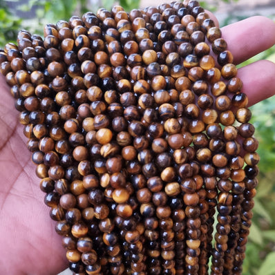 TIGER EYE '6 MM PLAIN' SUPER QUALITY AA SOLD BY PER LINE' 76-78 PIECES APPROX