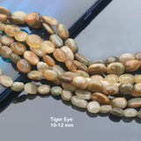 TIGER EYE ' SEMI-PRECIOUS BEADS, SOLD BY PER STRAND' ABOUT (24-30) BEADS' SIZE 8 MM APPROX