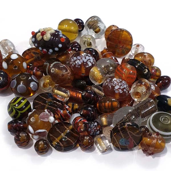 Brown fancy mixed glass beads,  sold by Per Pkg. 250 Gram. Size about 10mm to 16mm,